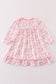 Pink nutcracker print girl ruffle gown